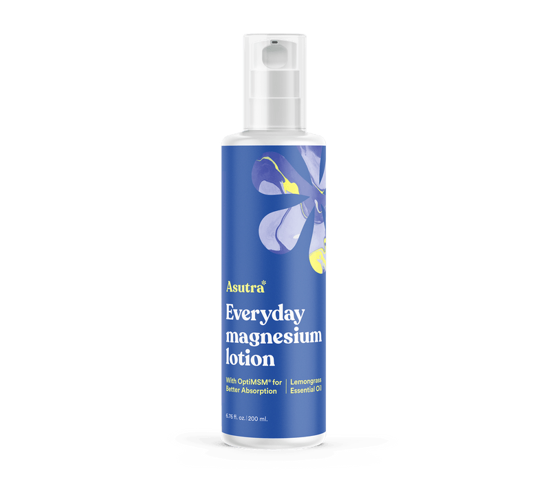 A 200ml blue bottle of Asutra Everyday Magnesium Lotion with a white pump, featuring a floral design and product details.