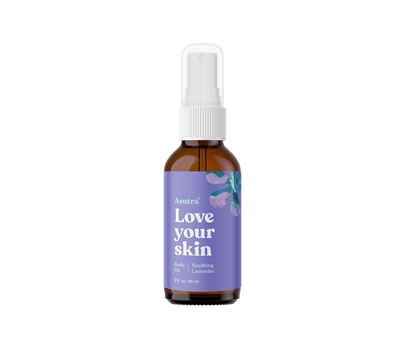 Brown glass bottle of lavender body oil with a white spray cap, labeled "Love your skin" in purple with lavender illustrations.