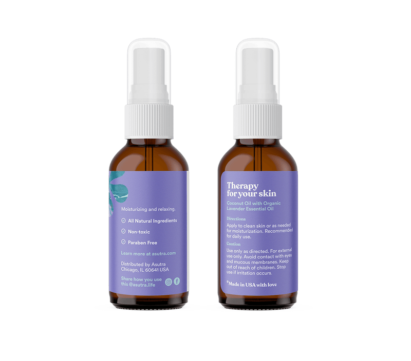 Amber glass bottles with white spray caps containing lavender body oil, featuring purple labels with product details and instructions.