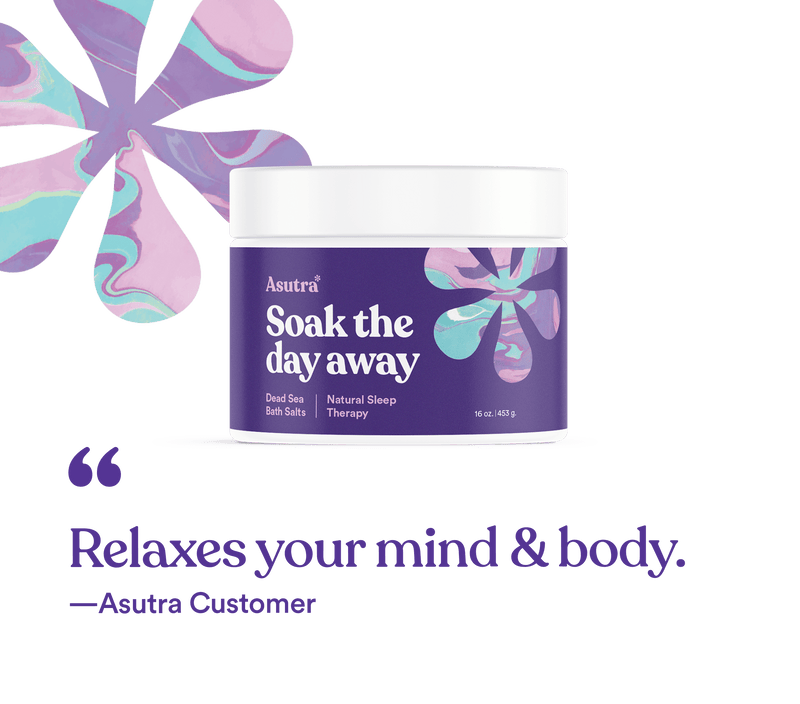 Jar of Asutra Natural Sleep Therapy Bath Salts with purple and pastel-colored floral design, accompanied by a relaxing quote.