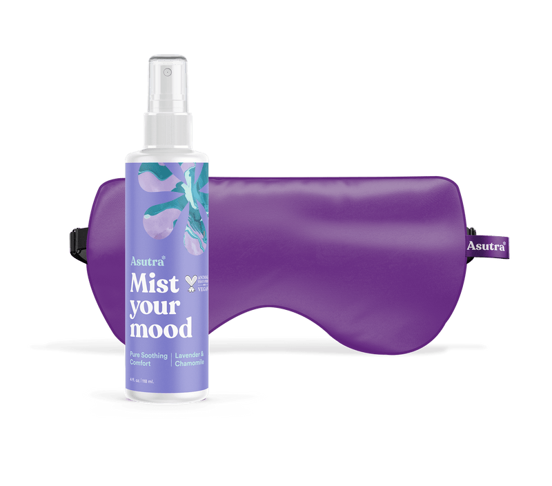 Purple eye pillow with Asutra lavender mist spray bottle labeled "Mist your mood" against a matching purple travel pouch.