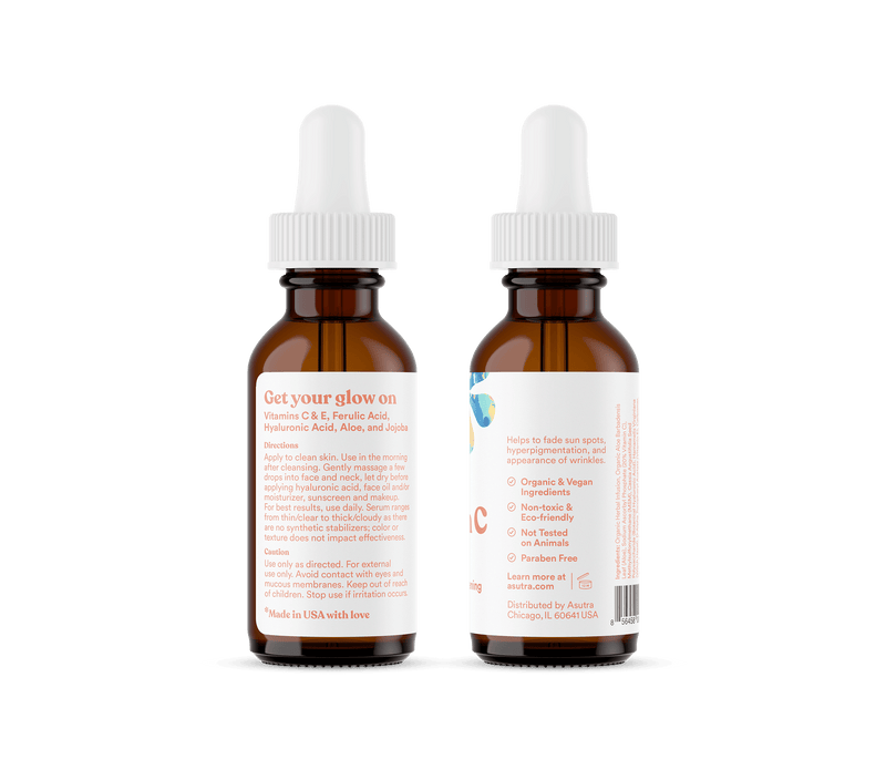 Amber glass bottles with white dropper caps containing Vitamin C anti-aging serum, featuring labels with product details and benefits.