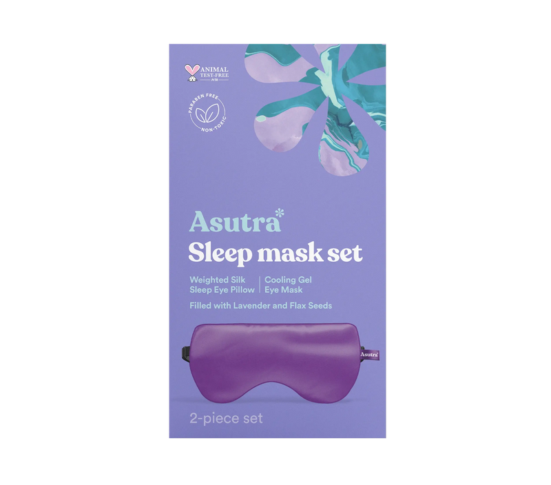 Purple silk sleep mask and weighted eye pillow in a purple gift box, part of the Asutra sleep mask set.