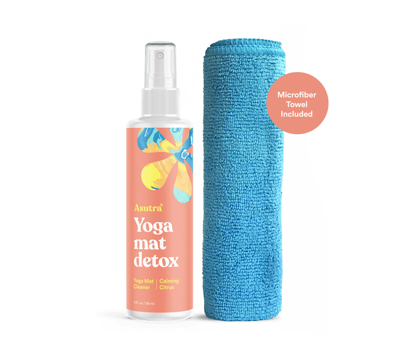 Calming Citrus Yoga Mat Cleaner spray bottle with microfiber towel, designed for cleaning and detoxing yoga mats.