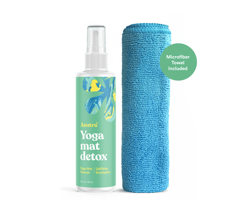 Uplifting eucalyptus yoga mat cleaner spray with microfiber towel, designed to refresh and sanitize yoga mats.