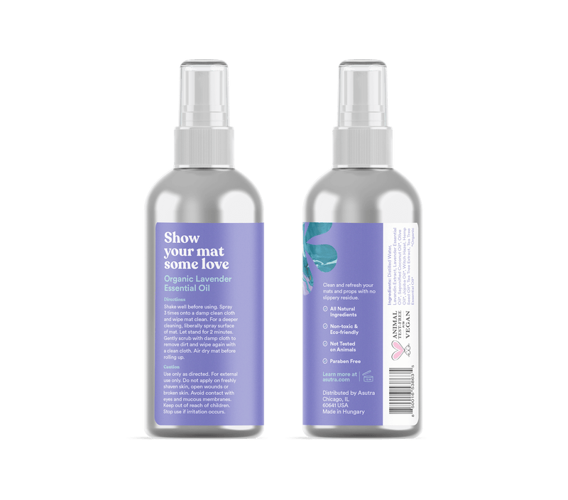 Aluminum bottle of Lavender Yoga Mat Cleaner with spray nozzle, labeled "Show your mat some love" and featuring a purple and blue design.