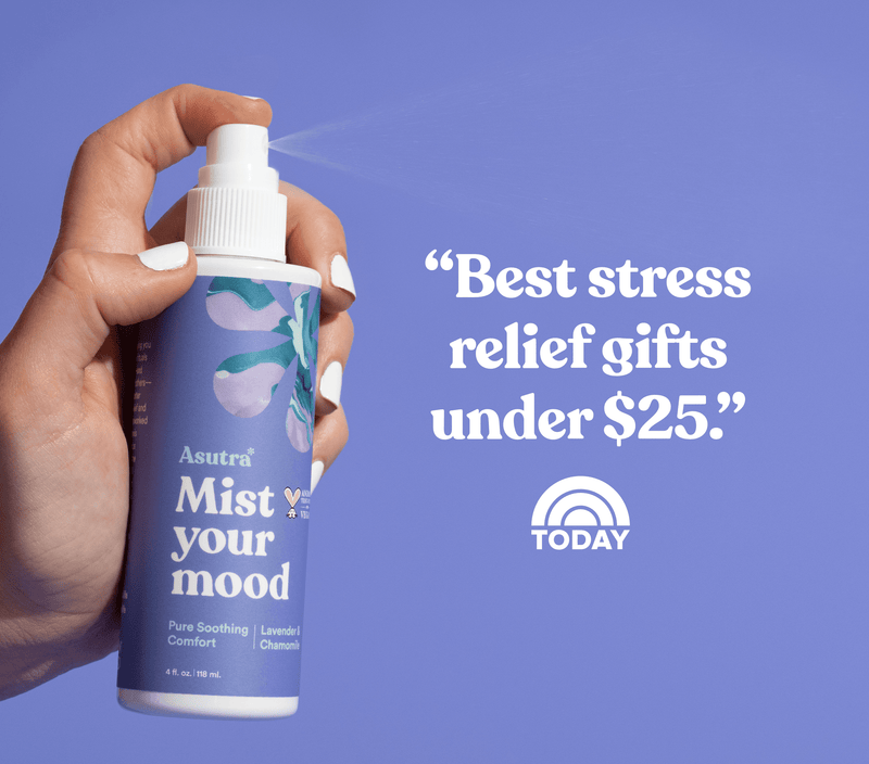 A hand sprays Asutra Mist Your Mood with lavender and chamomile, accompanied by a quote calling it a top stress relief gift under $25.